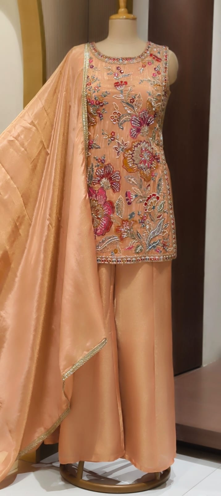 Floral Bloom Pastel Hand-Embroidered Sleeveless Short Kurti with Palazzo & Sheer Dupatta Set In Tissue Fabric- 15308