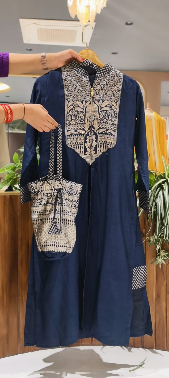 Brocade Highlights Yoke Solid A-Line Classy Indo-Wear With Seperate Potli- 16227